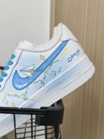 Custom Air Force 1 Low Sneakers | Hand-Painted Paper Plane Cloud Design - Image 3