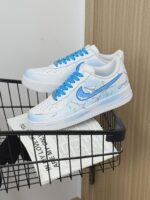 Custom Air Force 1 Low Sneakers | Hand-Painted Paper Plane Cloud Design - Image 2