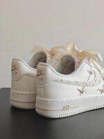 Custom Cream Air Force 1 Low Sneakers with Rhinestones and Satin Bow - Image 2