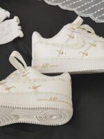 Custom Cream Air Force 1 Low Sneakers with Rhinestones and Satin Bow - Image 5