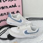 Custom Air Force 1 Low Sneakers: Minimalist Script Pattern, Light Blue Accents