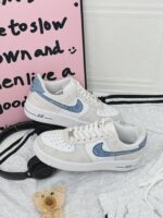 Custom Air Force 1 Low Sneakers: Minimalist Script Pattern, Light Blue Accents