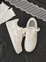 Custom Cream Air Force 1 Low Sneakers with Rhinestones and Satin Bow