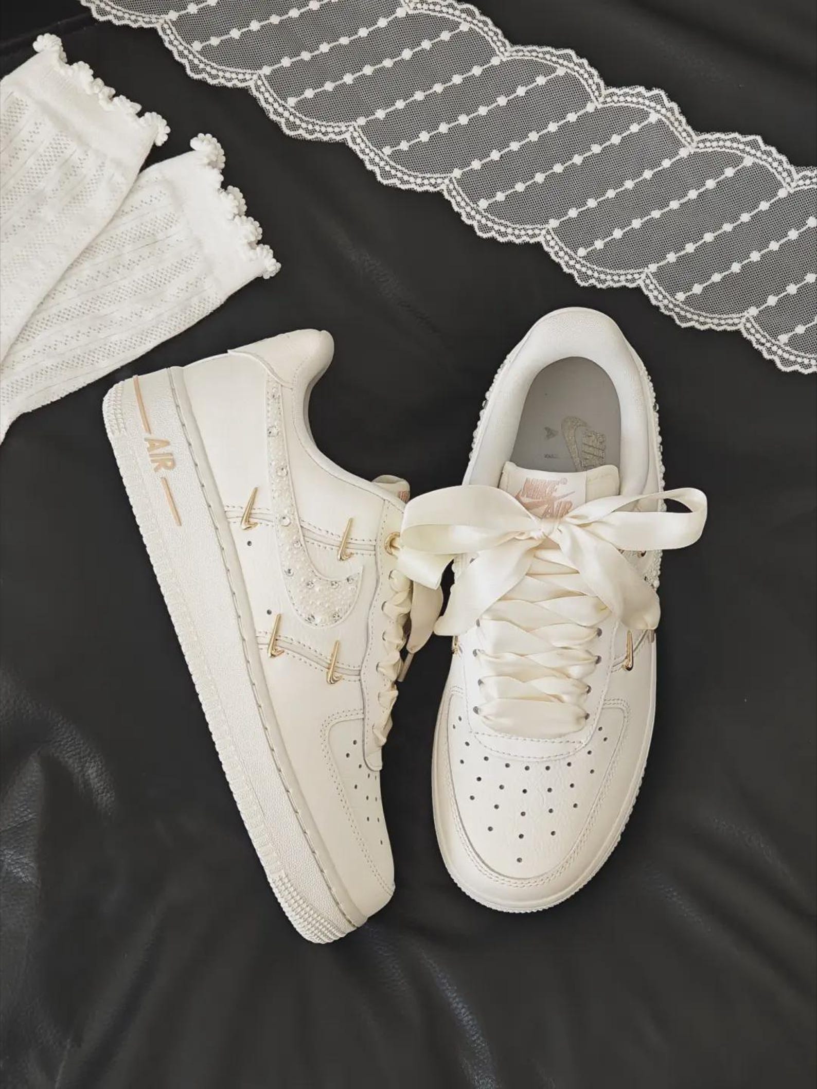 il_1588xN.7872473553_klgt.jpg Custom Cream Air Force 1 Low Sneakers with Rhinestones and Satin Bow - Image 1